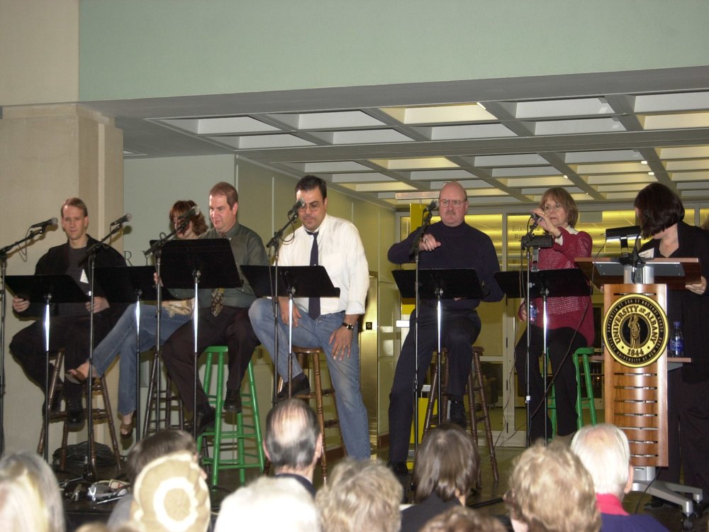 People on stage talking at "Two Millionth Volume" Ceremony