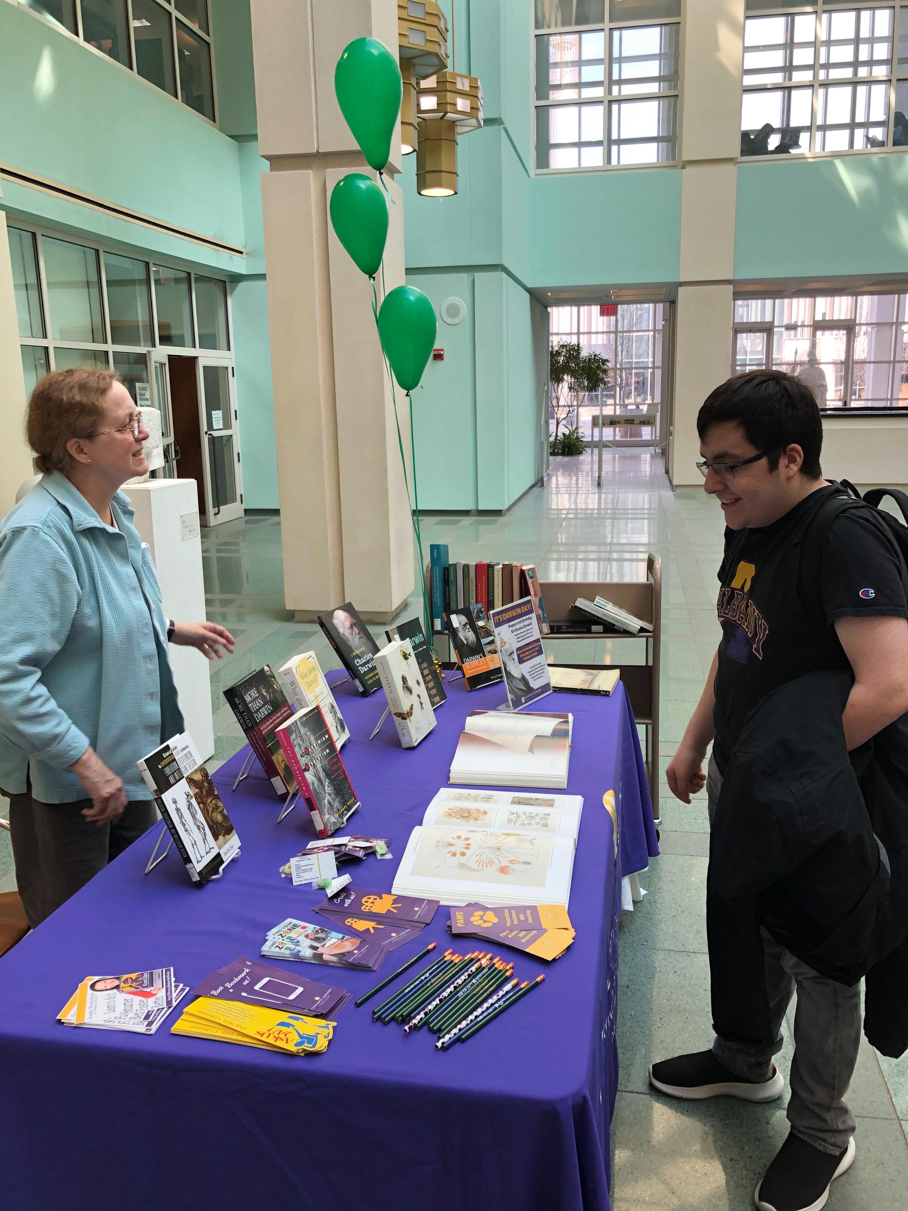 Sue Kaczor, Subject Librarian for Biology, Atmospheric & Environmental Science, General Science and Science Reference, meets with a student