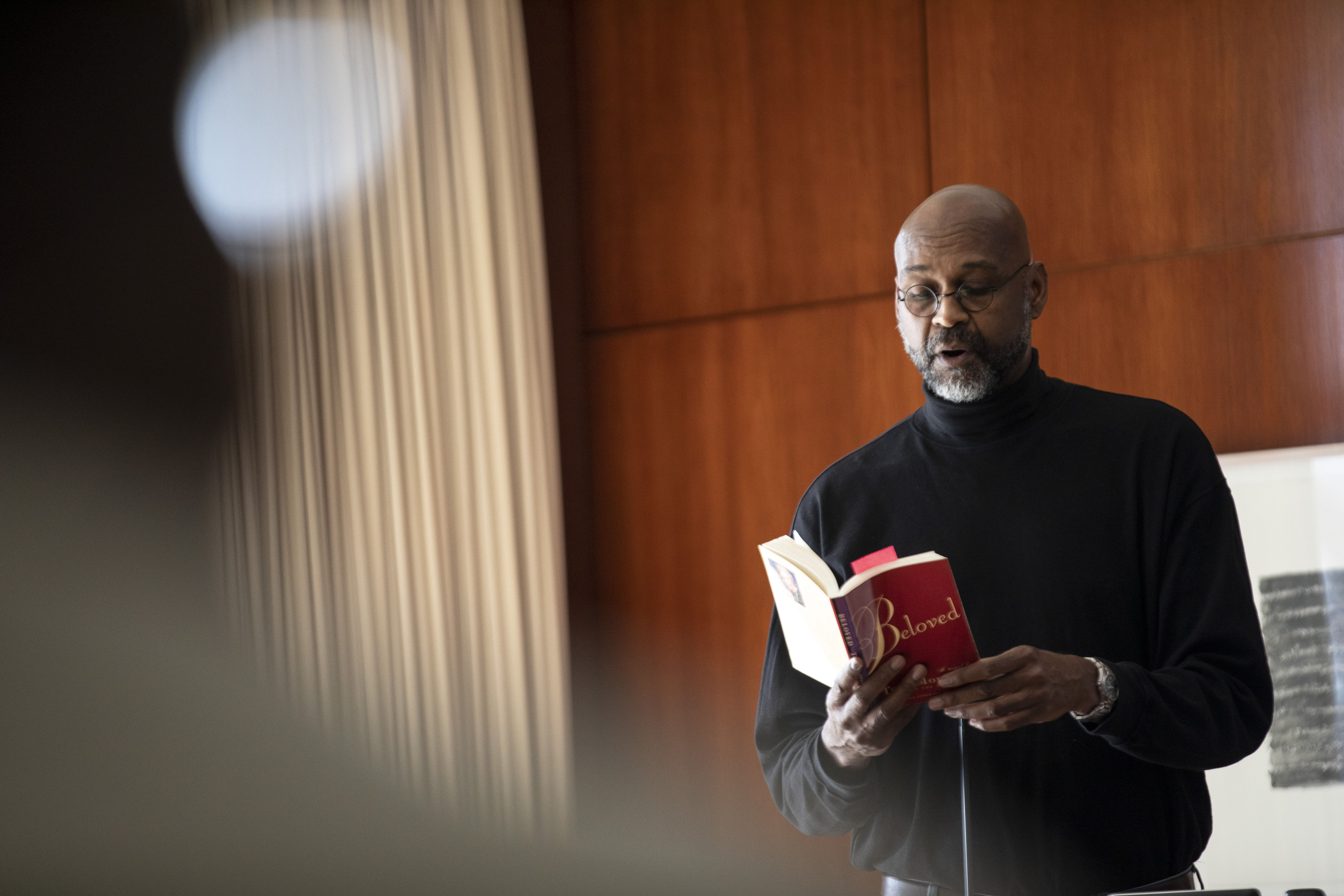 Professor Glyne Griffith reads in the Standish Room