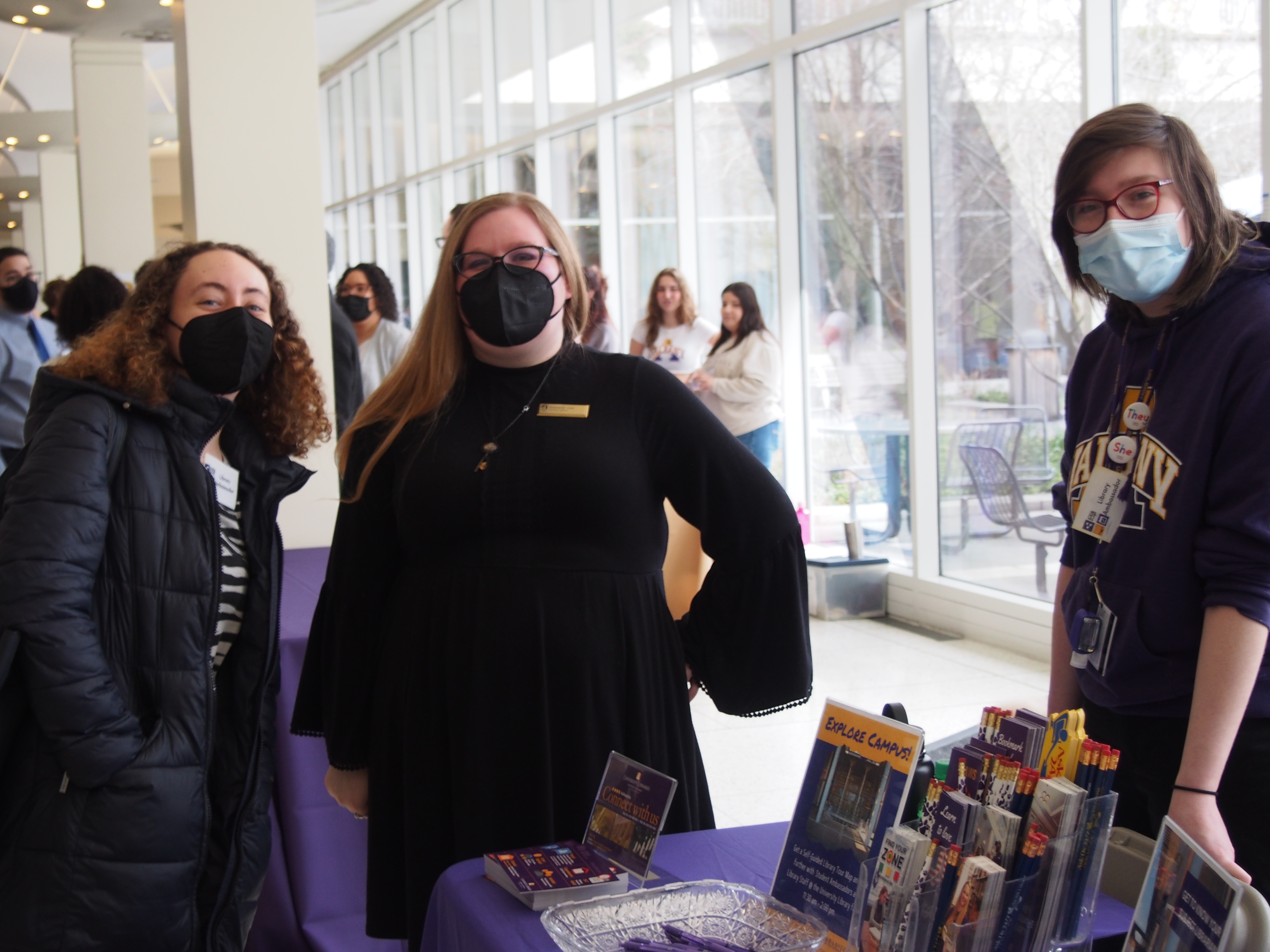 Fiona Hernandez (left), Amanda Lowe (center), and Melody Palmer (right) table in the Lecture Center