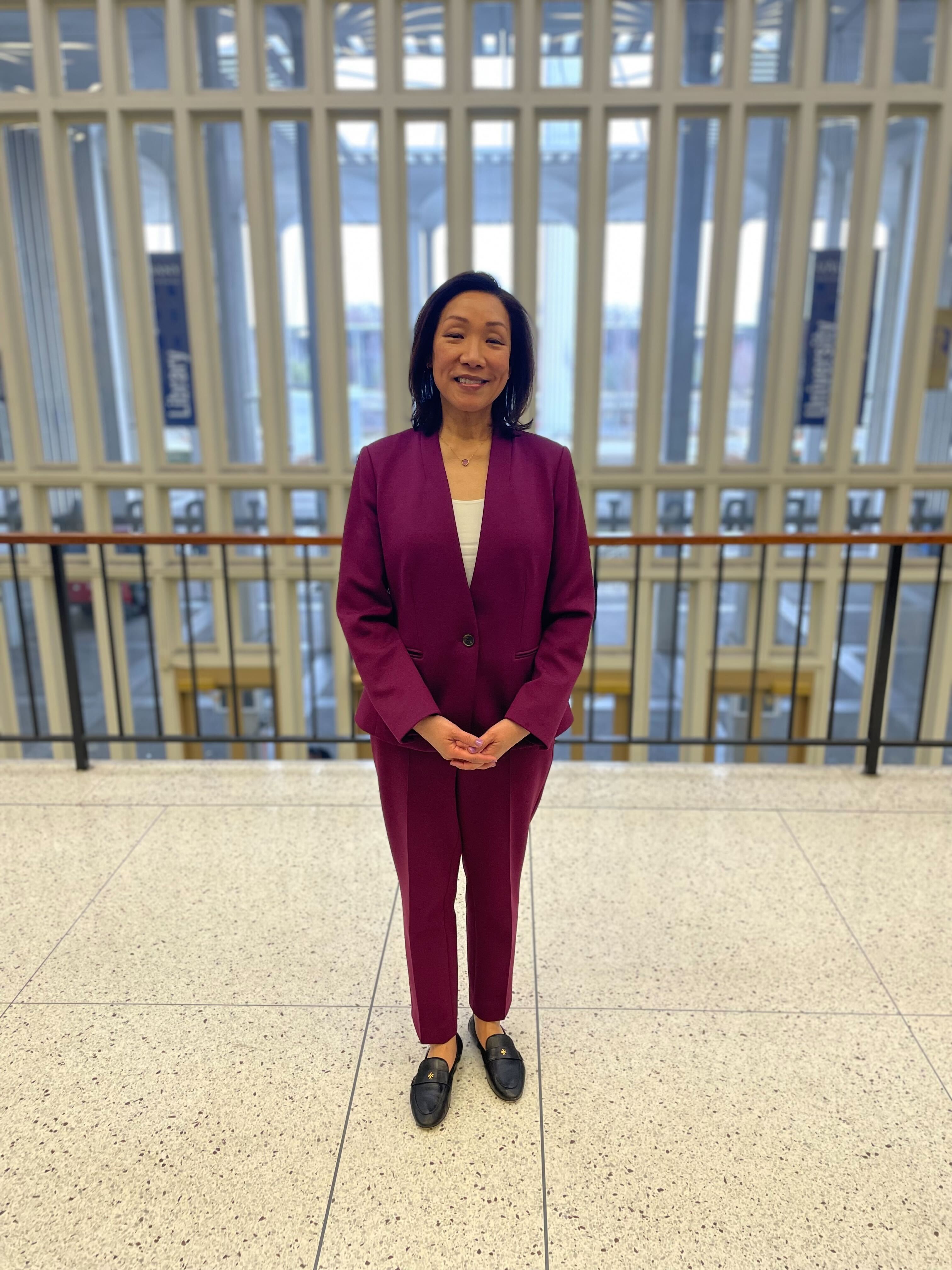 Provost Carol Kim on the University Library's balcony