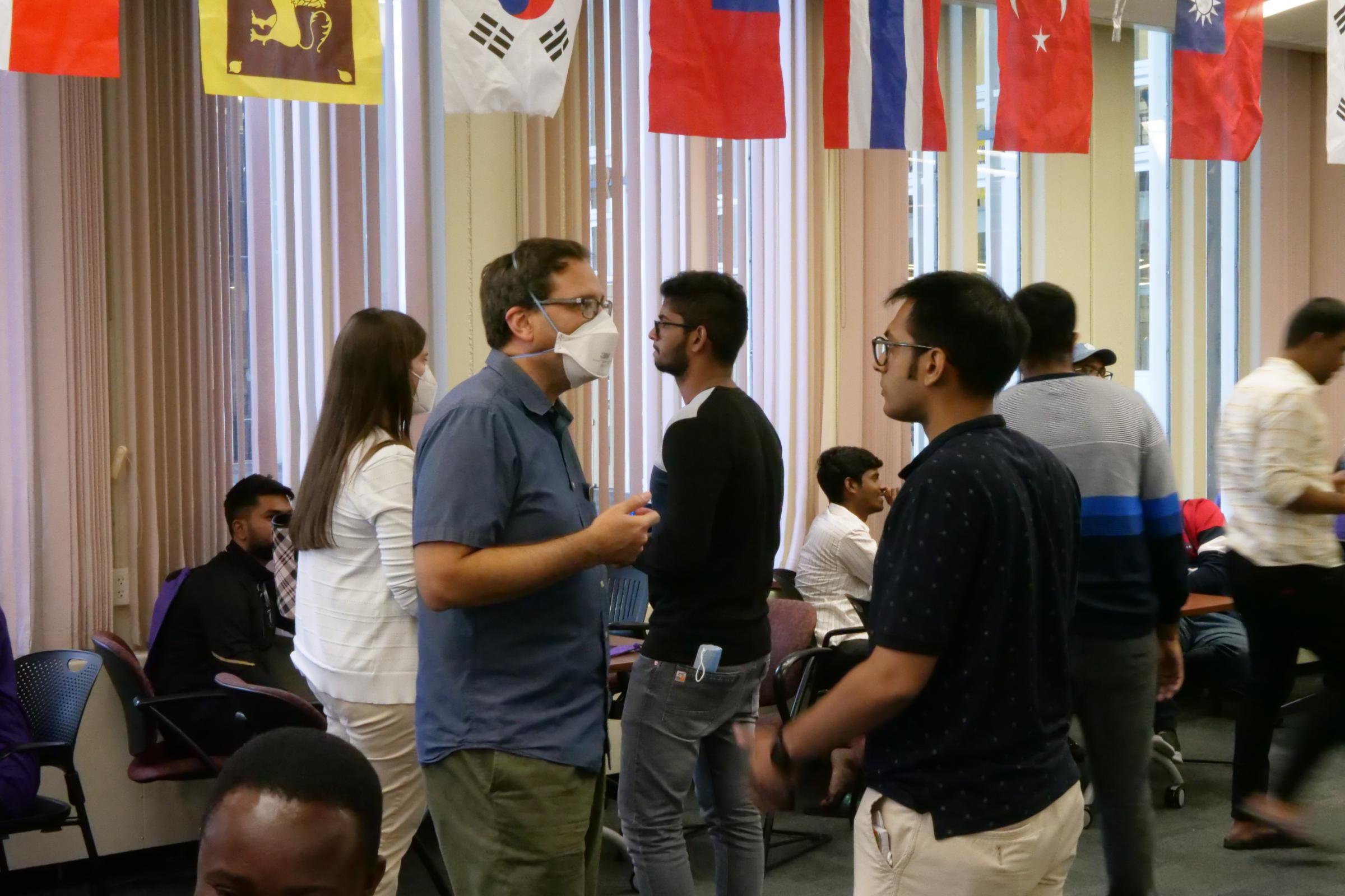 Jesús Alonso-Regalado (left) mingles with students